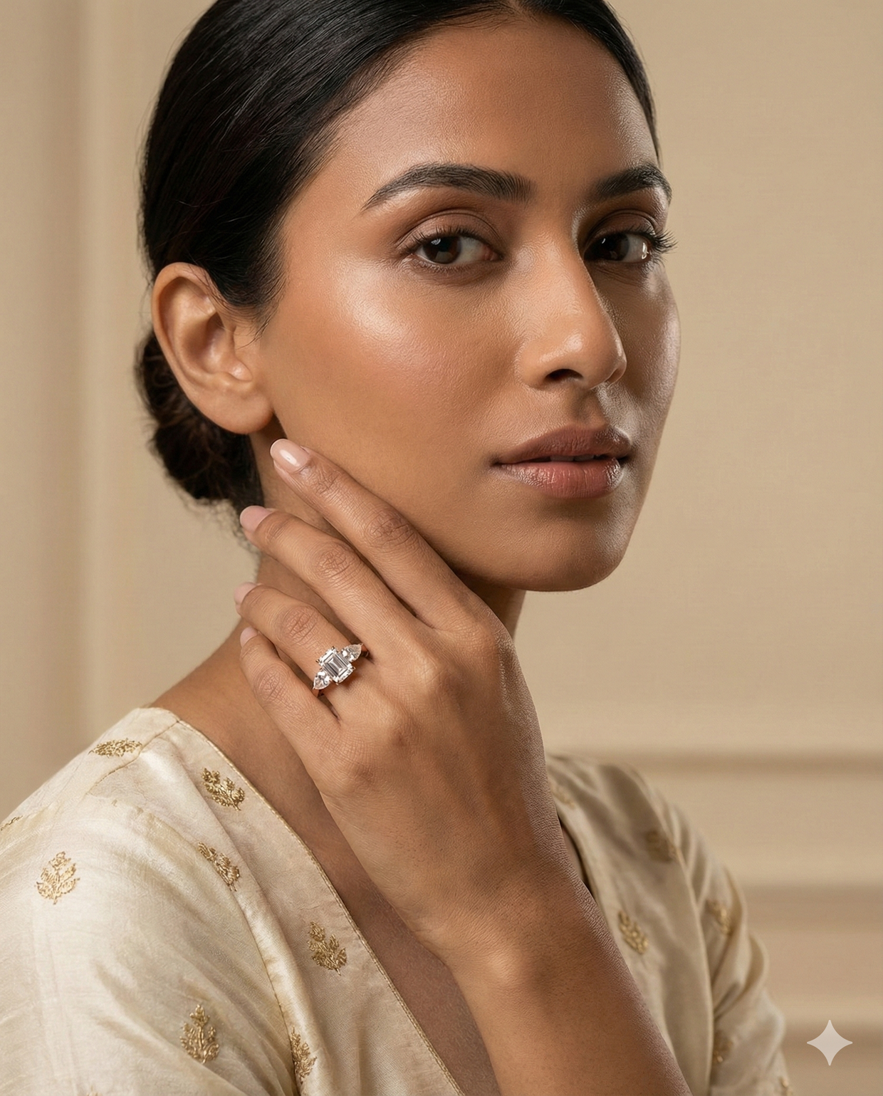 The Rose Gold Emerald & Pear Diamond Three-Stone Ring