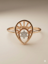The Rose Gold Sunburst Teardrop Diamond Ring
