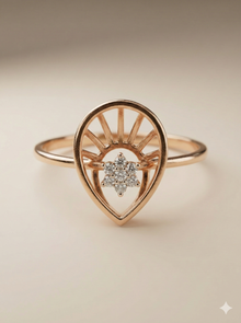 The Rose Gold Sunburst Teardrop Diamond Ring
