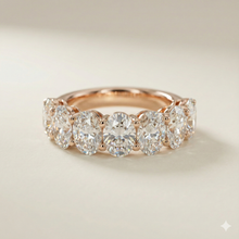 The Rose Gold Oval Cut Diamond Seven-Stone Band