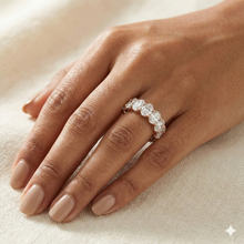 The Rose Gold Oval Cut Diamond Seven-Stone Band
