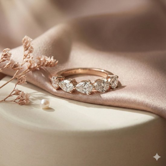 The Rose Gold Pear & Round Diamond Mixed Shape Five-Stone Ring