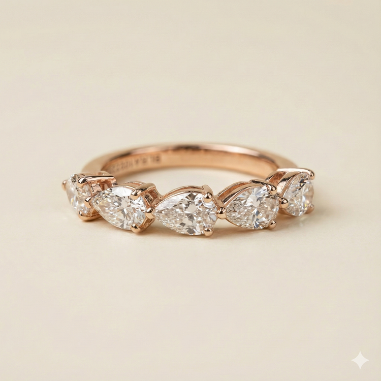 The Rose Gold Pear & Round Diamond Mixed Shape Five-Stone Ring