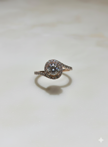 The Celestial Swirl Halo Ring in Rose Gold