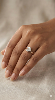 The Sweeping Pear Cut Diamond Ring