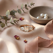 The Rose Gold Emerald & Pear Diamond Three-Stone Ring