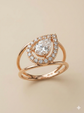 The Modern Floating Pear Split-Shank Ring in Rose Gold