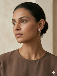 The Elegant Swirl Drop Diamond Earrings