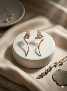 The Elegant Swirl Drop Diamond Earrings